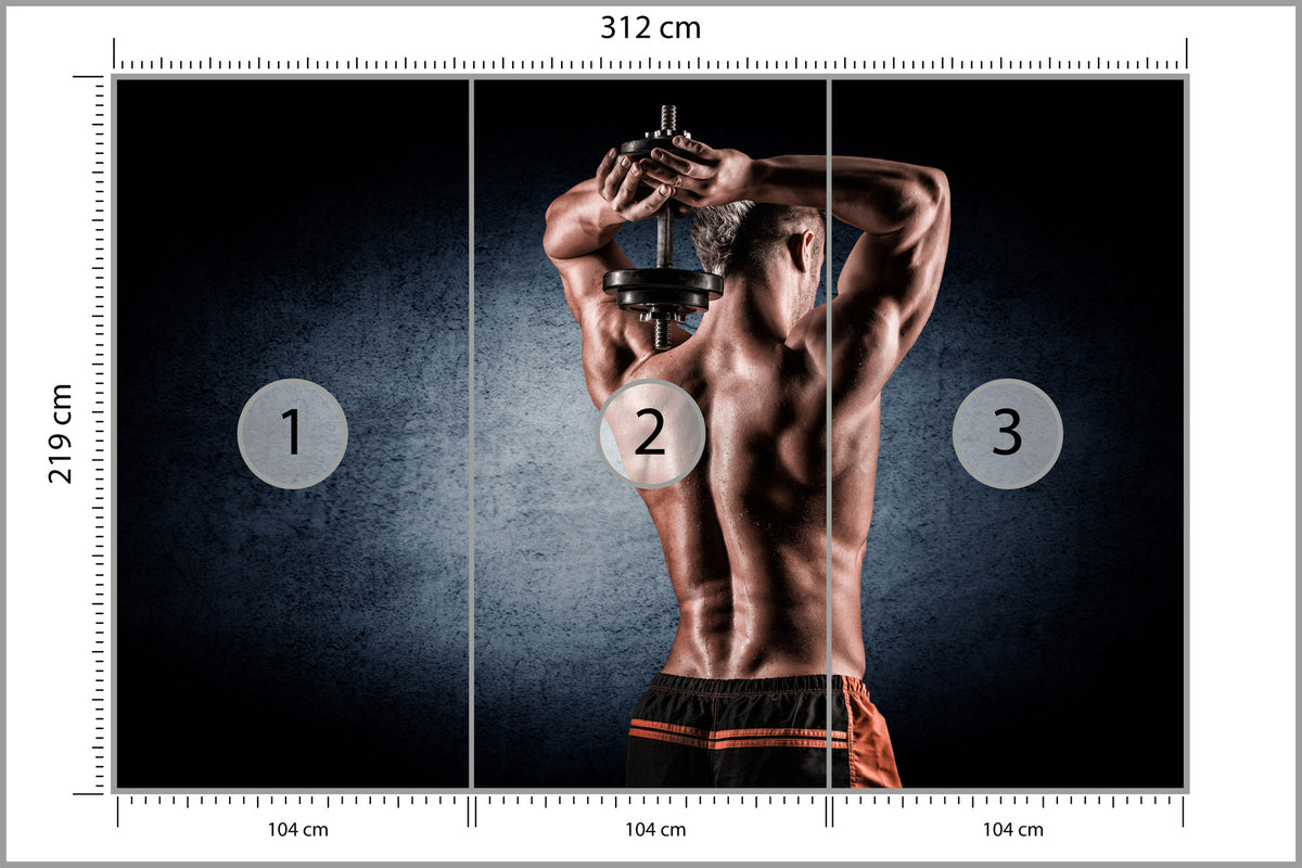 Fototapeta Umięśniony Mężczyzna Z Hantlem 312 × 219 cm – podgląd kadru
