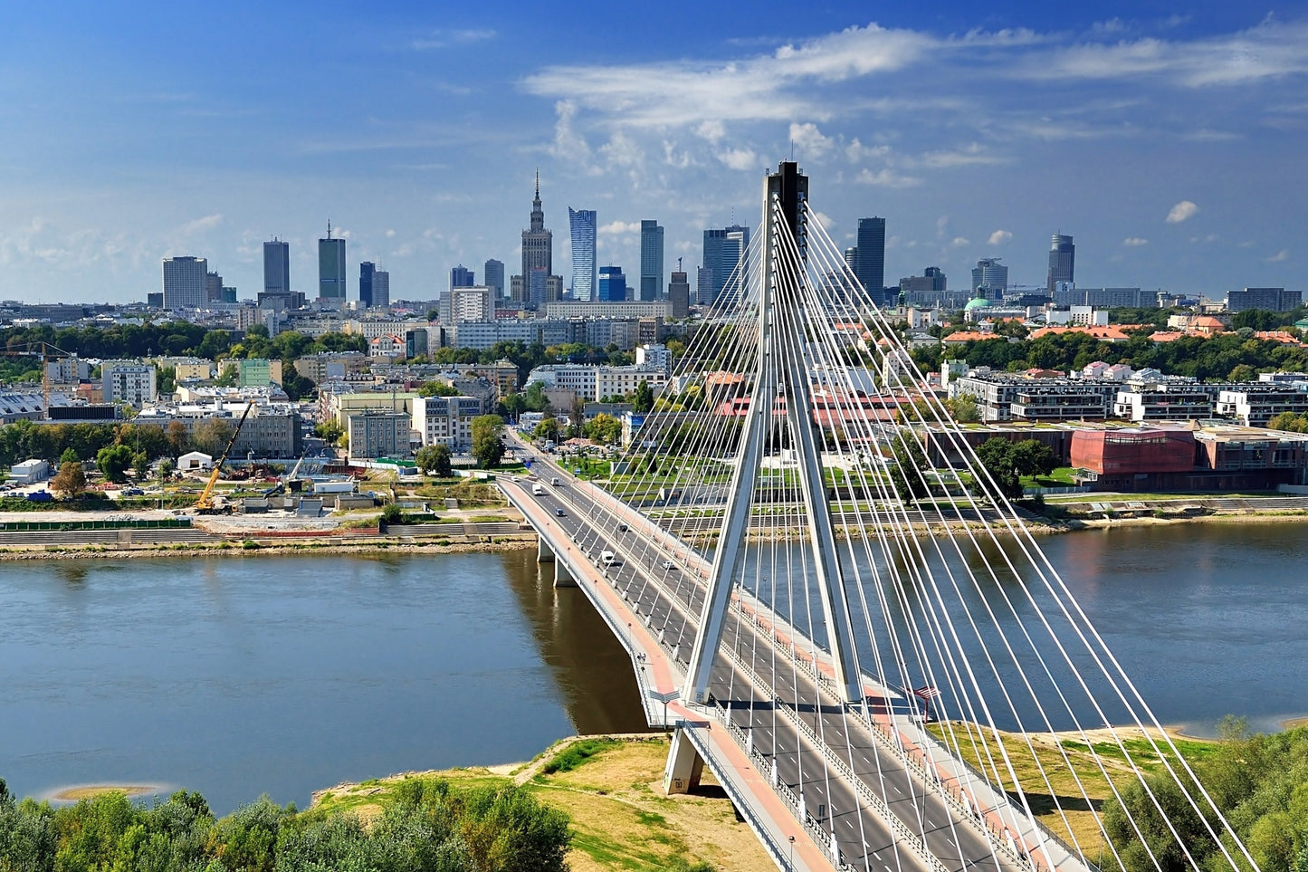 Obraz Wieloczęściowy Panorama Warszawy z Mostem – miejski akcent do wnętrz nowoczesnych i industrialnych 180x120