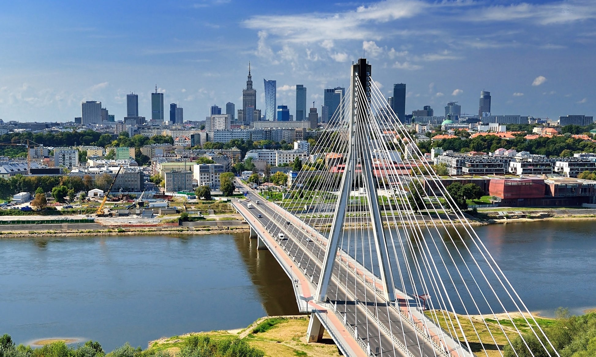 Obraz Wieloczęściowy Most z Panoramą Warszawy – miejski szyk do wnętrz nowoczesnych i loftowych 250x150