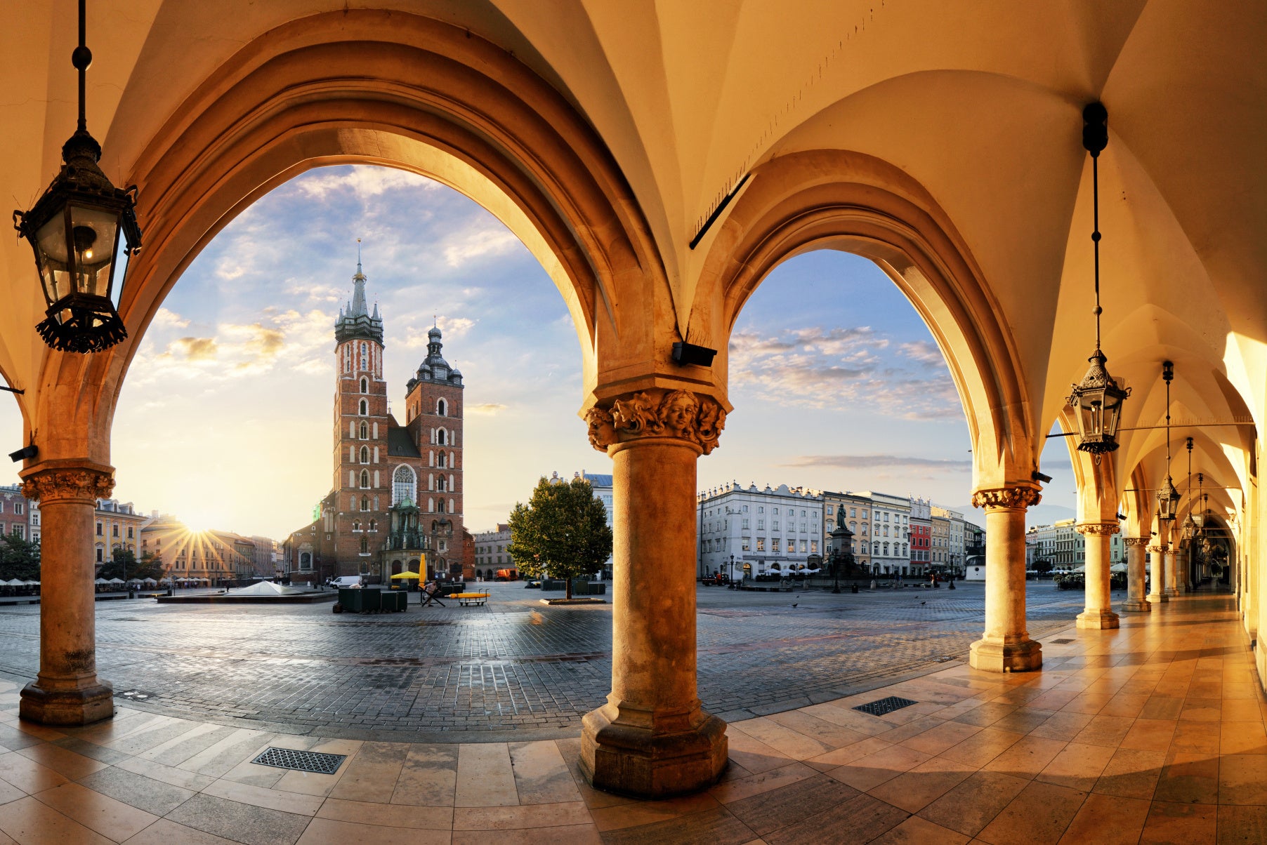 Obraz Wieloczęściowy Kraków O Zachodzie Słońca – malownicza panorama miejska do wnętrz nowoczesnych, klasycznych i eklektycznych 180x120