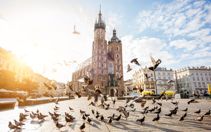 Obraz Wieloczęściowy Bazylika Mariacka – majestatyczny wschód słońca do wnętrz klasycznych i nowoczesnych 240x150
