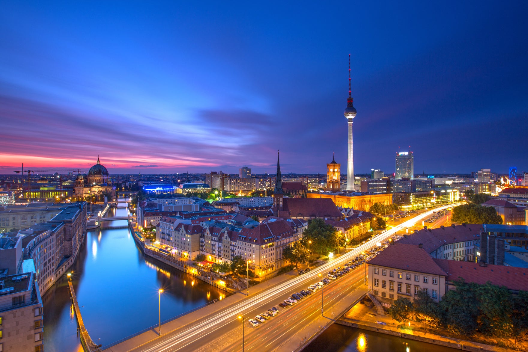 Obraz Wieloczęściowy Panorama Berlina – miejski zachód słońca do wnętrz nowoczesnych i industrialnych 180x120