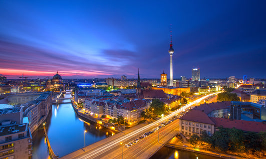 Obraz Wieloczęściowy Panorama Berlina – miejski zachód słońca do wnętrz nowoczesnych, industrialnych i loftowych 250x150