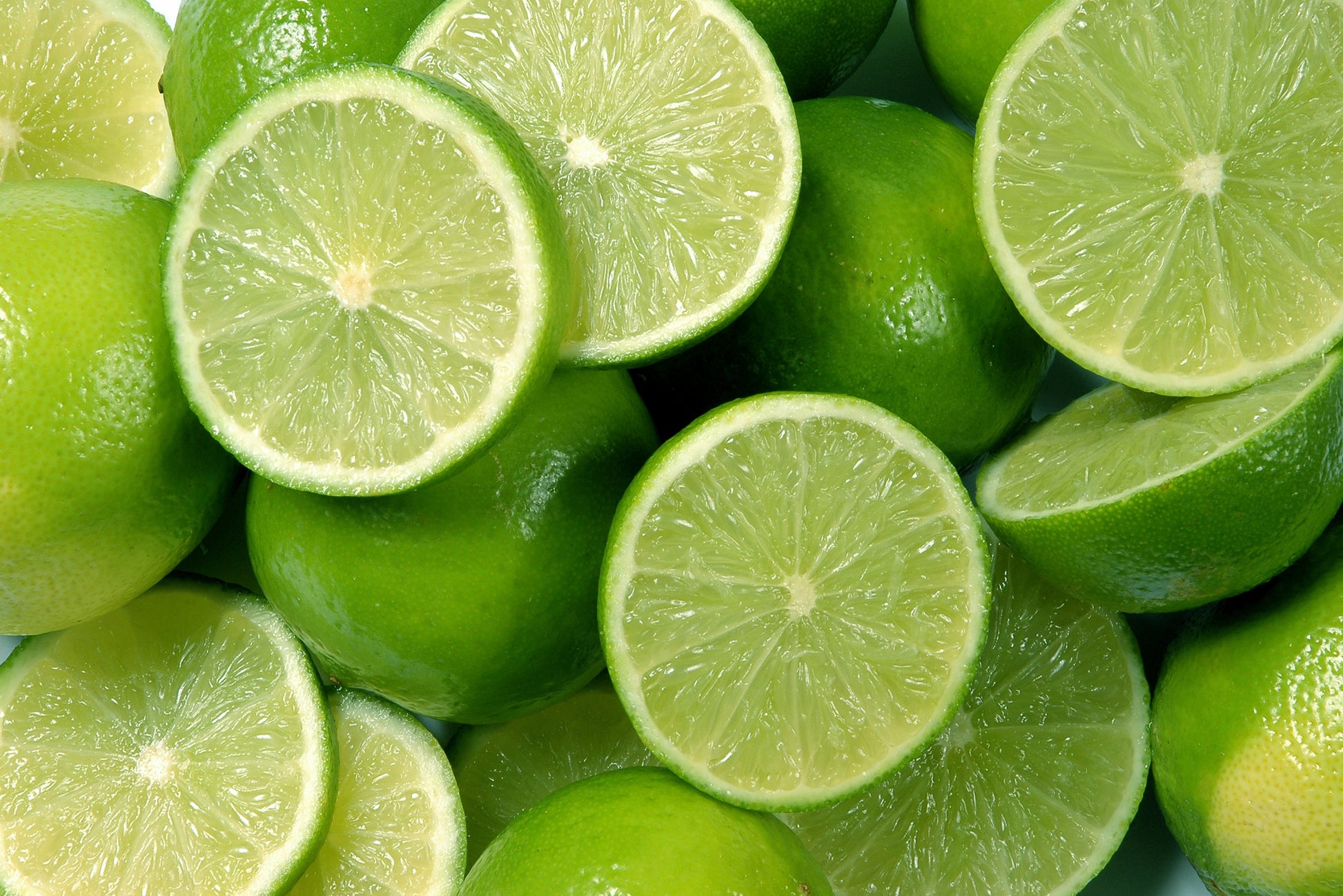 Obraz Wieloczęściowy Połówki Limonki – świeża energia do wnętrz nowoczesnych i skandynawskich 180x120