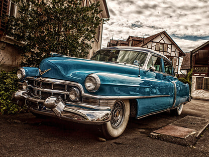 Obraz Wieloczęściowy Niebieski Cadillac Eldorado 1953 – ikona retro do wnętrz Mid-century Modern i Industrialnych 200x150