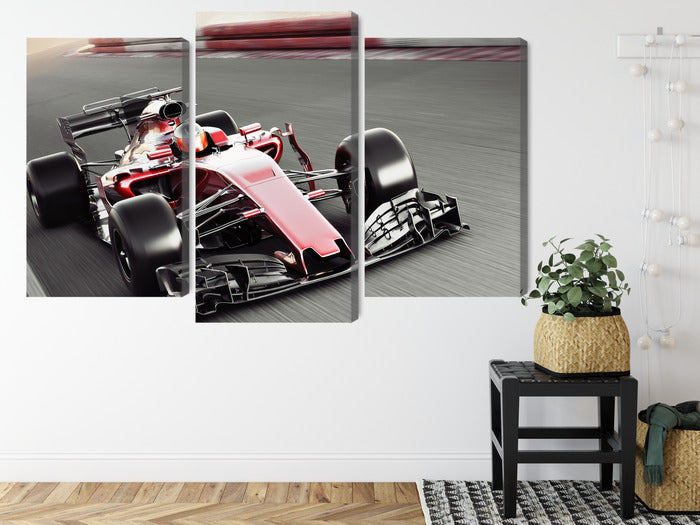 Obraz Wieloczęściowy Samochód F1 Na Torze – dynamiczna scena wyścigowa do wnętrz nowoczesnych i industrialnych – widok 7