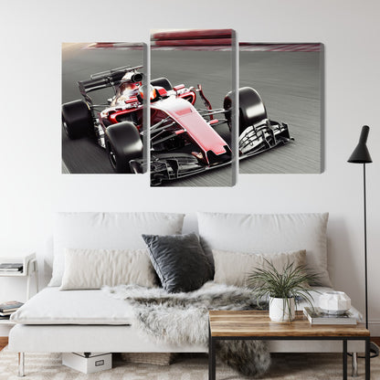 Obraz Wieloczęściowy Samochód F1 Na Torze – dynamiczna scena wyścigowa do wnętrz nowoczesnych i industrialnych – widok 3