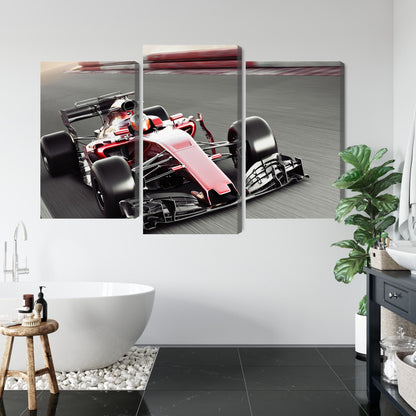 Obraz Wieloczęściowy Samochód F1 Na Torze – dynamiczna scena wyścigowa do wnętrz nowoczesnych i industrialnych – widok 4