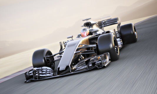 Obraz Wieloczęściowy Samochód Formuły 1 – dynamiczna scena sportowa do wnętrz nowoczesnych i młodzieżowych 250x150